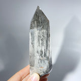 AMPHIBOLE IN QUARTZ POINT