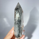 AMPHIBOLE IN QUARTZ POINT