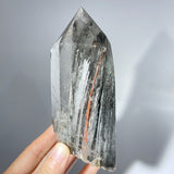 AMPHIBOLE IN QUARTZ POINT