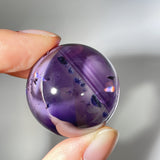 AMETHYST PHANTOM HOLLANDITE SPHERE