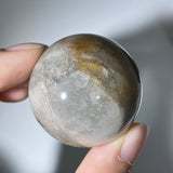 AMPHIBOLE WITH QUARTZ IN QUARTZ RAINBOW SPHERE